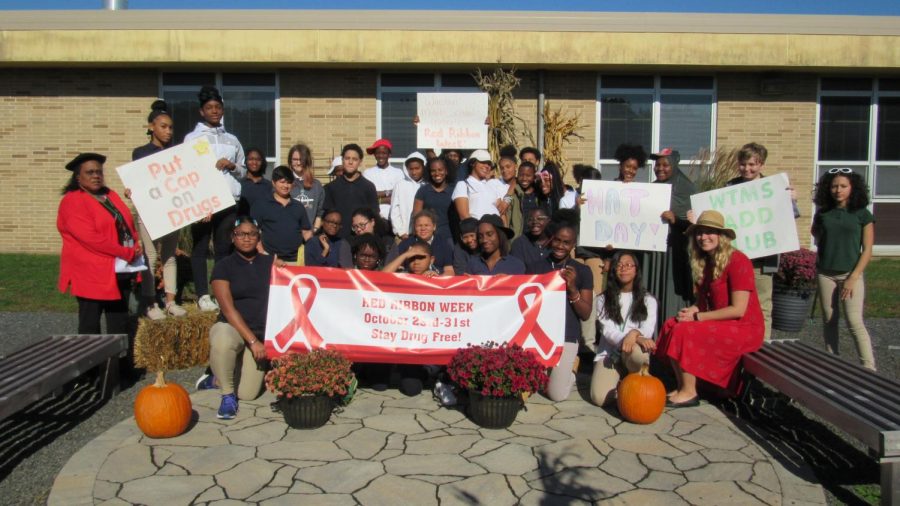 Members of SADD Club pose in the Bernzomatic Garden to celebrate their successful Red Ribbon Week. 