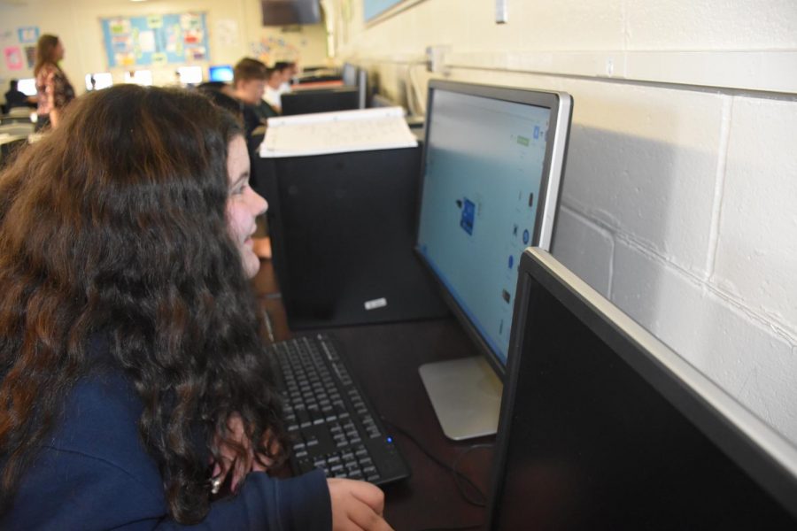 8th grader, Jaycee Norcross in her 3rd period STEM works diligently on the computer.
