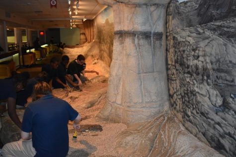 Students experienced what it was like to dig for fossils in the exhibit focused on dinosaurs and Pangea.