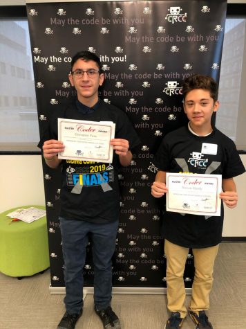 Vega, right, and Hardy, left, pose with their winners certificates. Both boys were thrilled to place 4th in the regional competition.