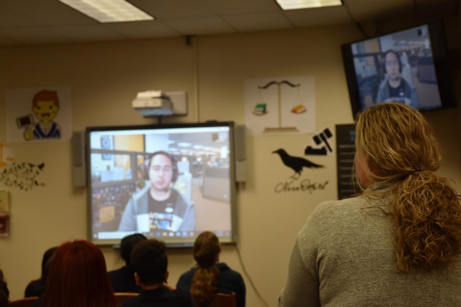 Media Specialist Mrs. Storako looks on as Wozniak speaks with Chens students.