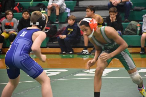 Winslow wrestler facing off against Hammonton earlier in the season.