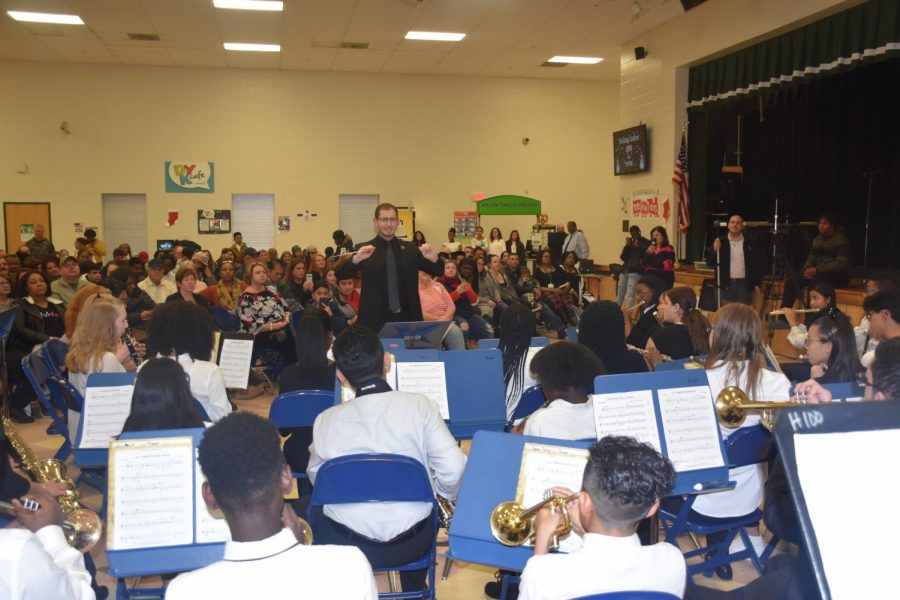Mr. Garonzik directing the band during the 2019 Winter Concert. Although it will look different, students will still be presenting holiday favorites through recorded performances this year.