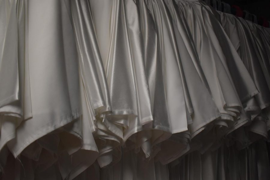 Gowns+are+sorted+and+ready+to+be+distributed+to+students+the+final+day+of+practice+for+the+promotional+ceremony.++Students+are+excited+this+has+been+moved+from+a+virtual+presentation+to+an+in-person+event.