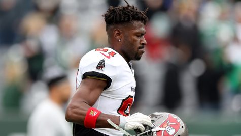EAST RUTHERFORD, NEW JERSEY - JANUARY 02:  Antonio Brown #81 of the Tampa Bay Buccaneers looks on against the New York Jets during the game at MetLife Stadium on January 02, 2022 in East Rutherford, New Jersey. (Photo by Elsa/Getty Images)