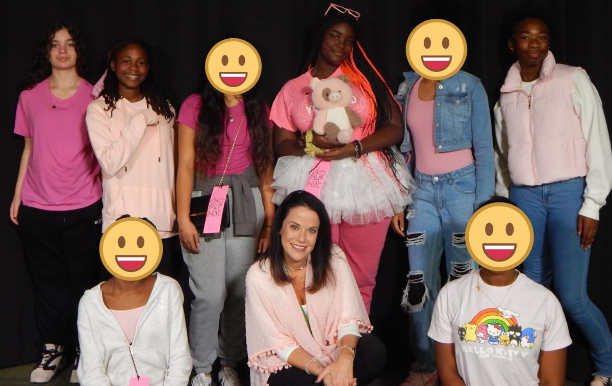 8th Graders and their teacher, Mrs. Irvin on Pink Out Day 