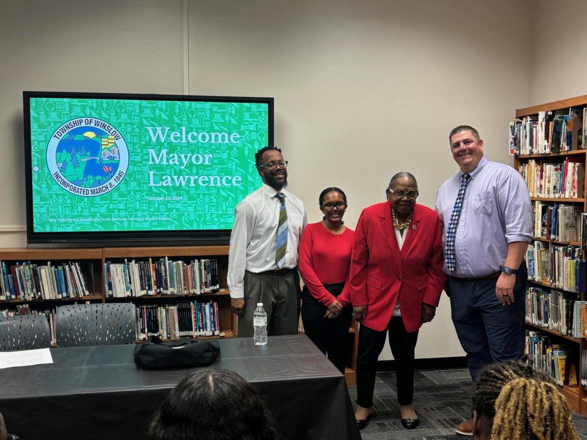 Mayor Lawrence joined by Building Principal, Mr. Shropshire, Journalism student, Autumn Perry & Assistant Principal, Mr. Wright